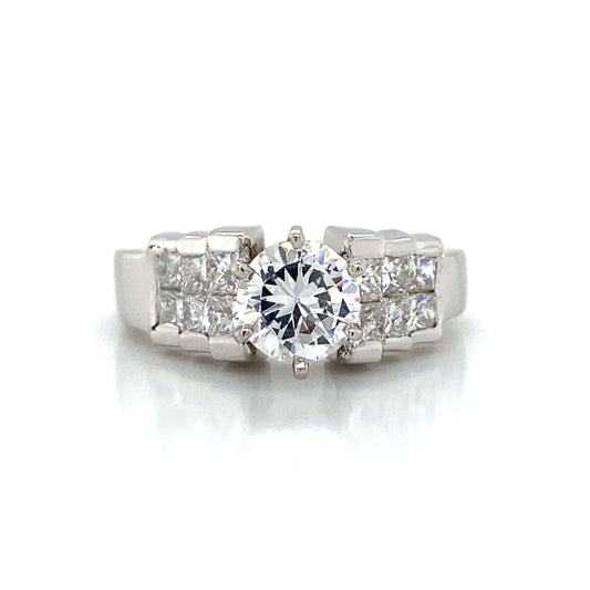 Side Stone Channel Engagement Ring in 18K White Gold
