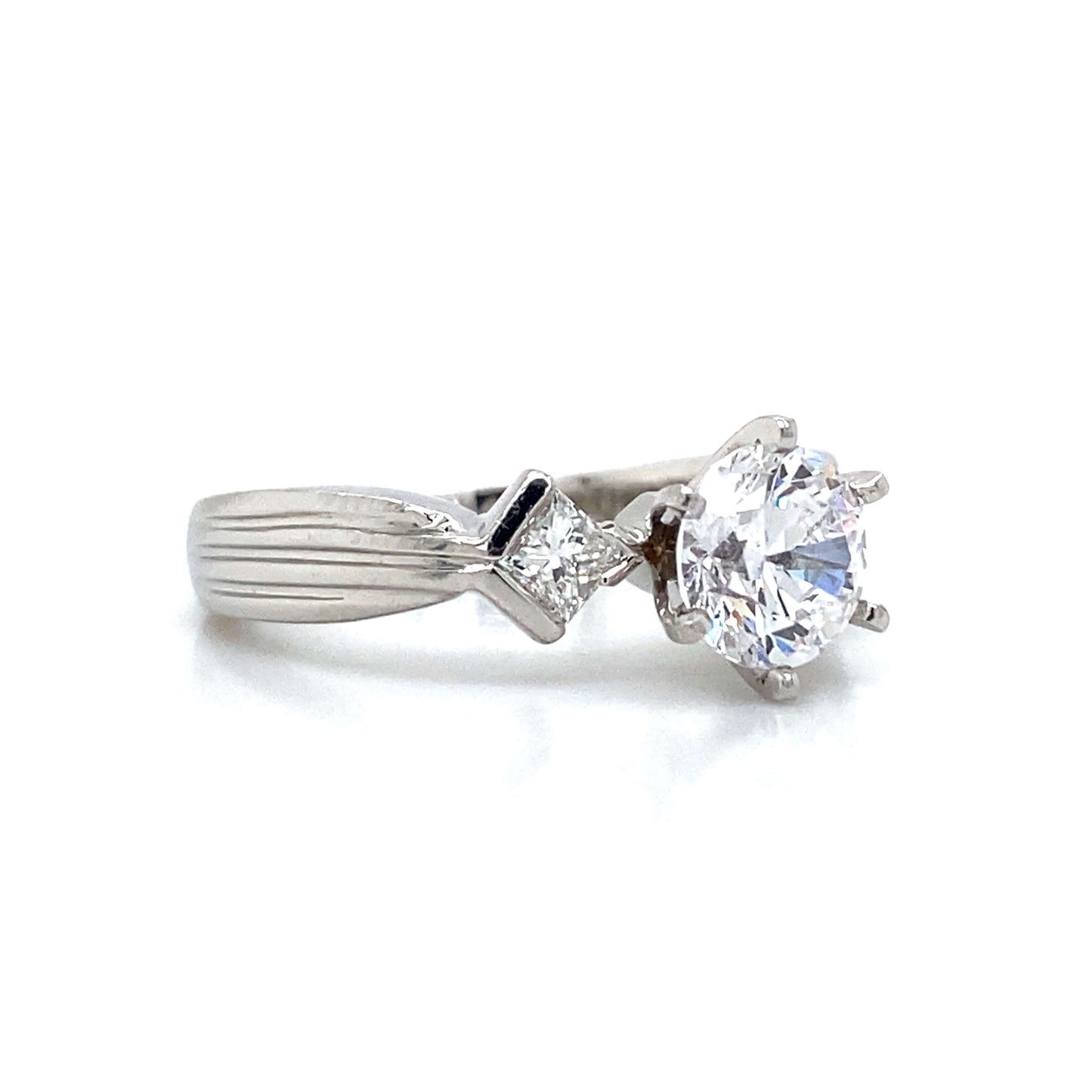 Three Stone Princess Shaped Engagement Ring in Platinum