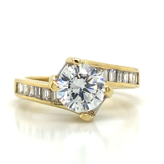 Side Stone Bypass Channel Set Engagement Ring in 18K Yellow Gold