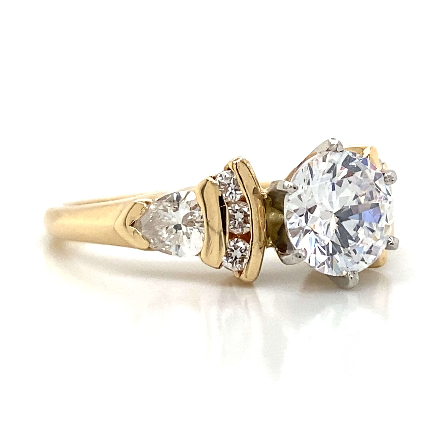 Side Stone Graduating Engagement Ring in 14K Yellow Gold