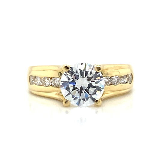 Side Stone Channel Set Engagement Ring in 18K Yellow Gold