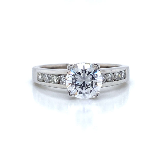 Side Stone Channel Set Engagement Ring in Platinum