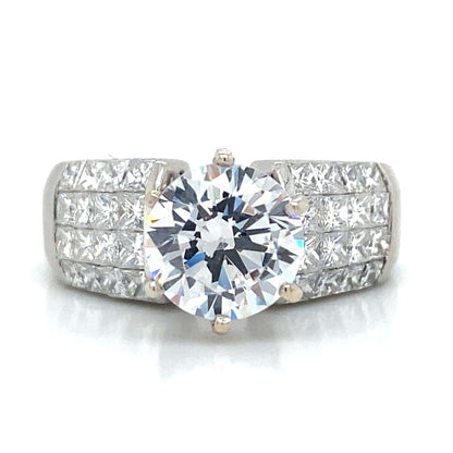 Side Stone Invisible Set Engagement Ring in Platinum