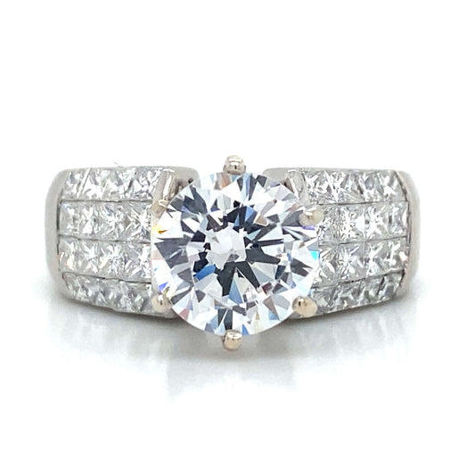 Side Stone Invisible Set Engagement Ring in Platinum