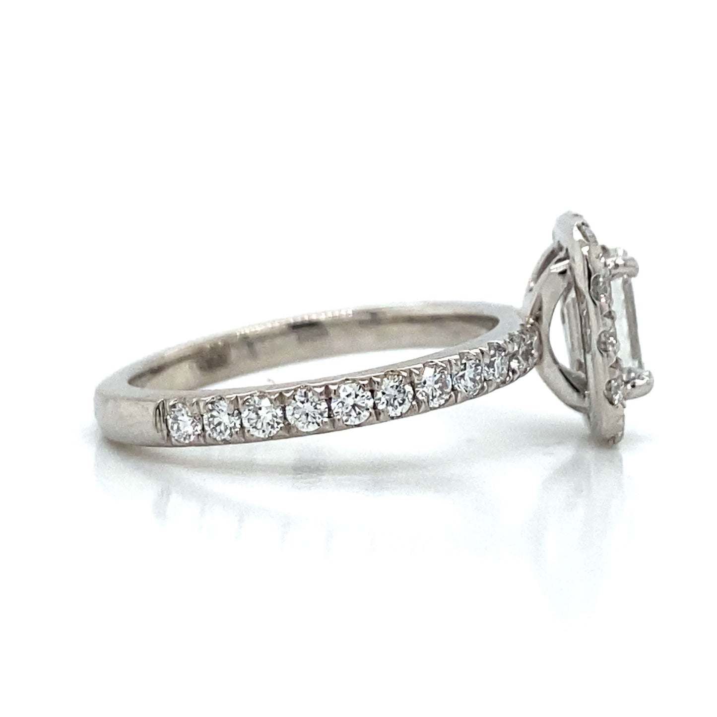 Emerald Halo Engagement Ring in Platinum