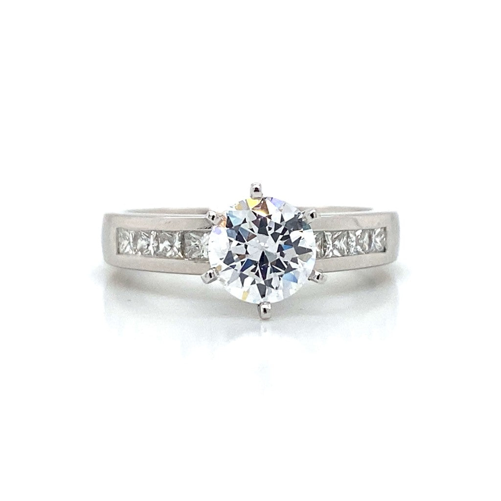 Side Stone Channel Engagement Ring in Platinum