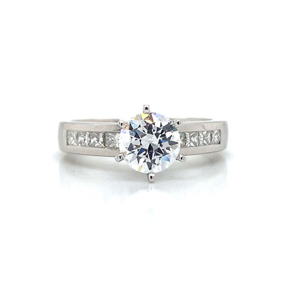 Side Stone Channel Engagement Ring in Platinum
