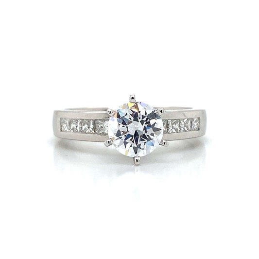 Side Stone Channel Engagement Ring in Platinum