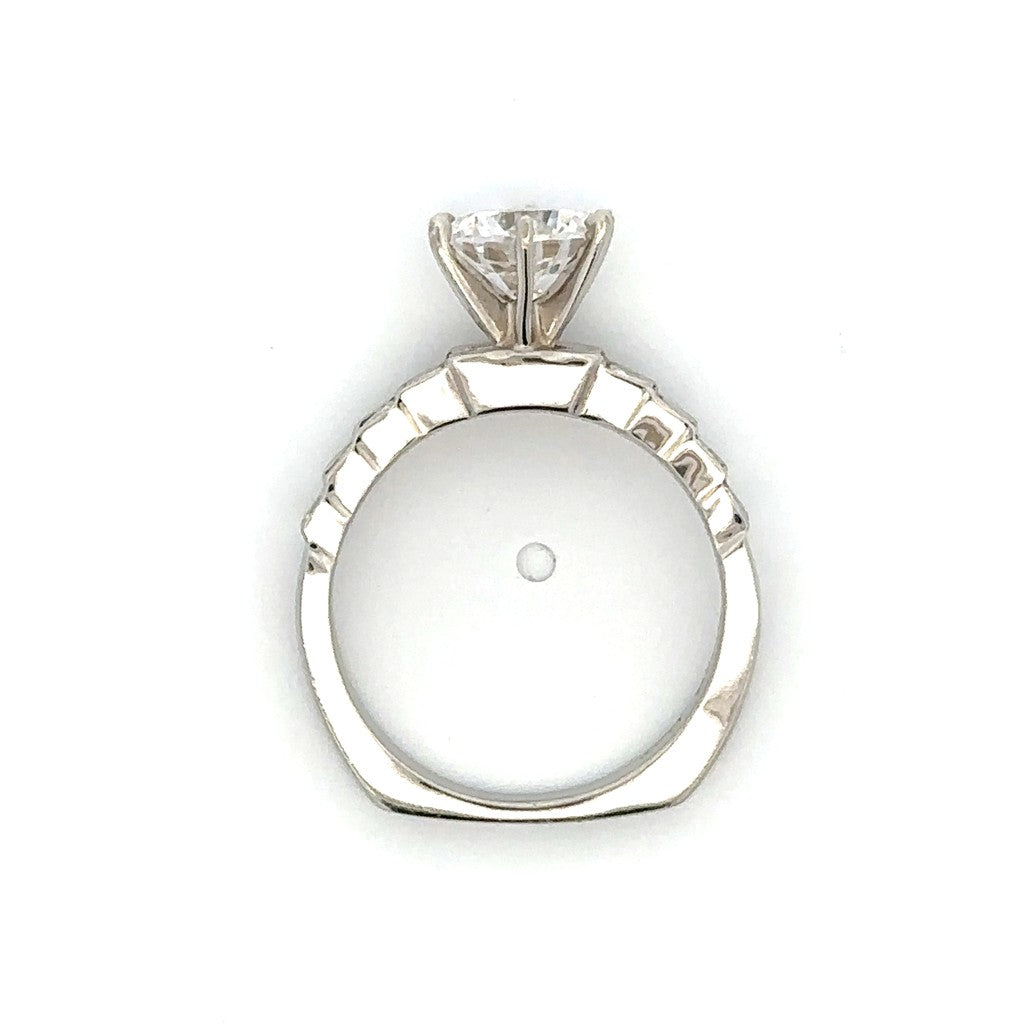 Side Stone Step Channel Engagement Ring in Platinum