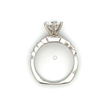 Side Stone Step Channel Engagement Ring in Platinum