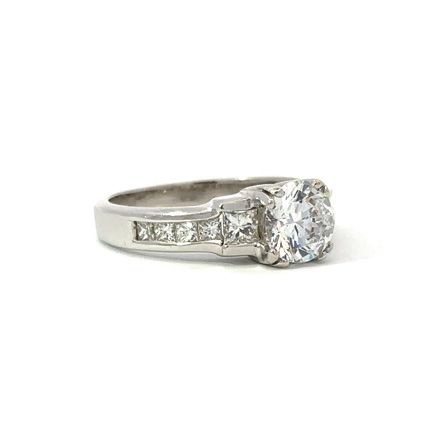 Three Stone Princess Shaped Engagement Ring in Platinum