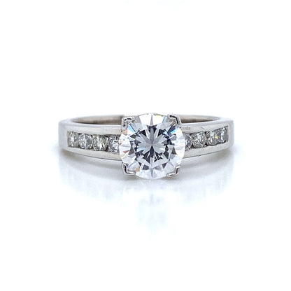 Side Stone Channel Set Engagement Ring in Platinum